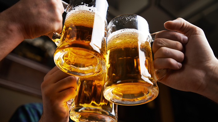 beer in line (Credit: mediaphotos/ iStock)