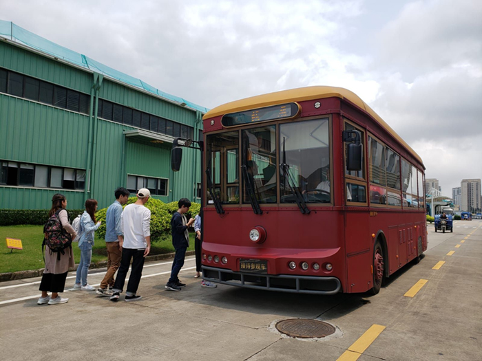 Delegates take a tour around the Yinlong manufacturing plant on one of its EV Buses 700 Delegates take a tour around the Yinlong manufacturing plant on one of its EV Buses
