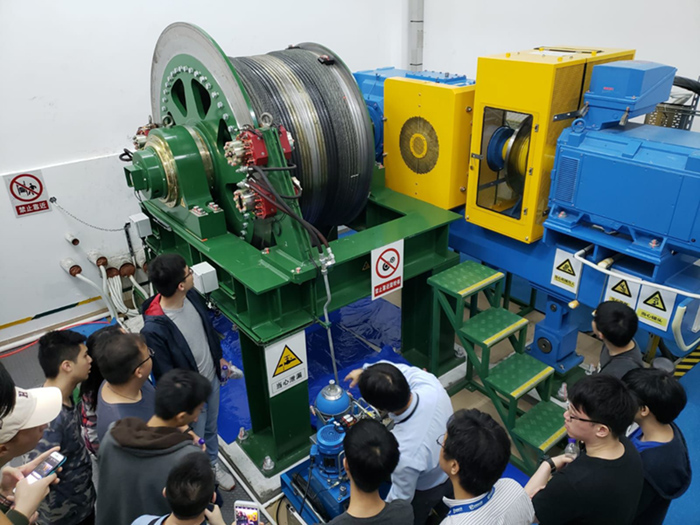 Peeking behind the scenes to see the Dual disk break clutch connected motor driving the amusement rides
