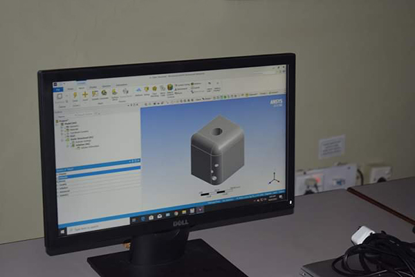 A student simulating a model on ANSYS  