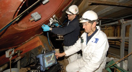 Babcock staff examine a weld using phased array technology Article image