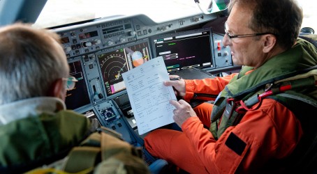 Guy Magrin, experimental flight test pilot, prepares for the first flight Article image